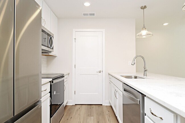 Building Photo - Dog-Friendly End-Unit Apartment