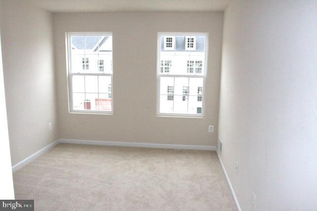 Building Photo - 7568 Stonehouse Run Dr