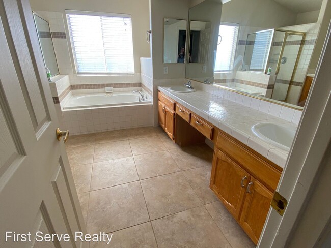 Building Photo - 9195 Grand Mountain Cir