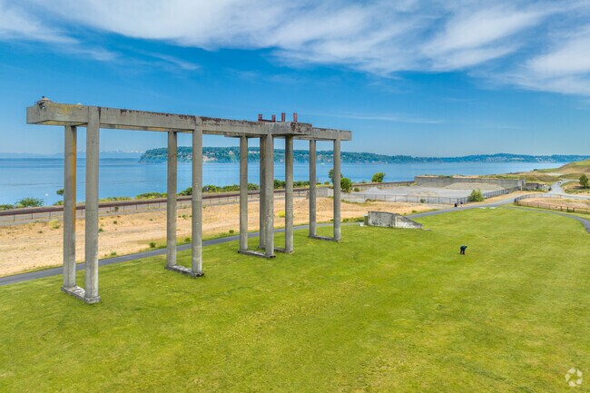 A beautiful structure rises from the beach in Chambers Creek Regional Park.