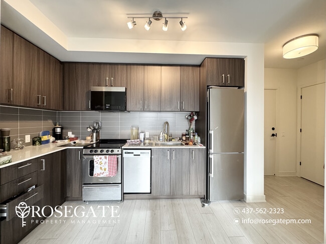 Building Photo - Modern 2-Bedroom + Den Condo with Balcony,...