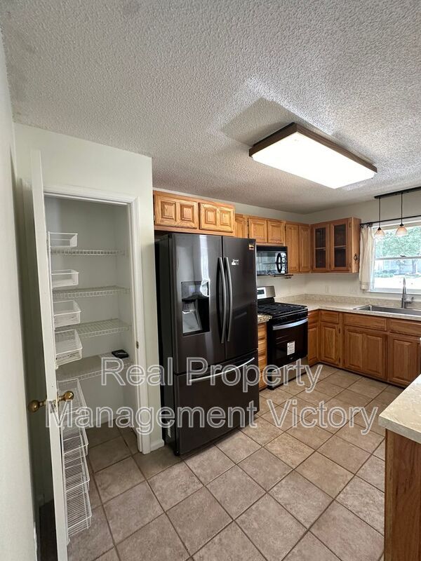 Foto del edificio - 5321 Whisperwood Drive