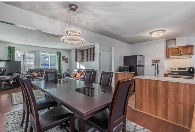 Building Photo - 2402-2450 50 St NE