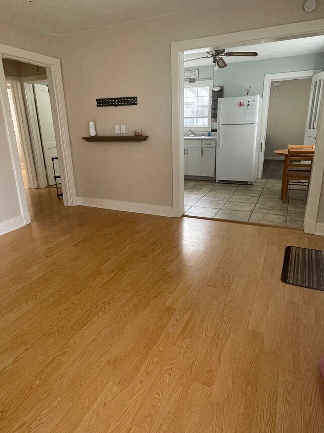 Living Room area open to kitchen. - 2415 Old North Hills St