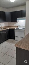 Building Photo - 5404 NW 24th Ct