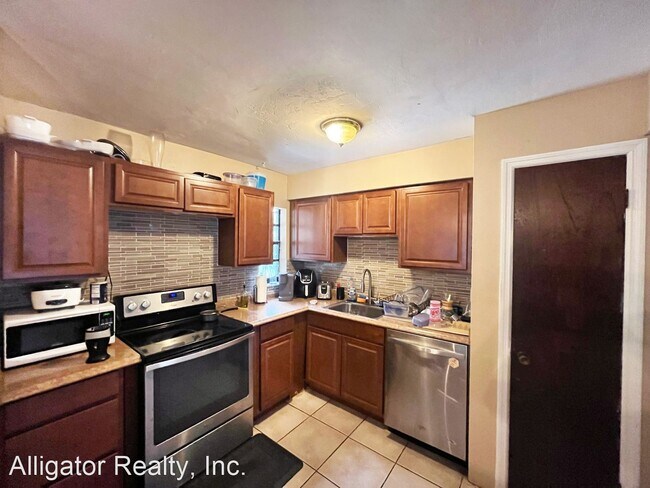 Foto del edificio - 4 br, 2 bath House - 727 NW 10th Street
