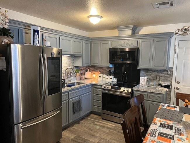 Building Photo - Solar Panels included on the 3 bedroom 2 b...