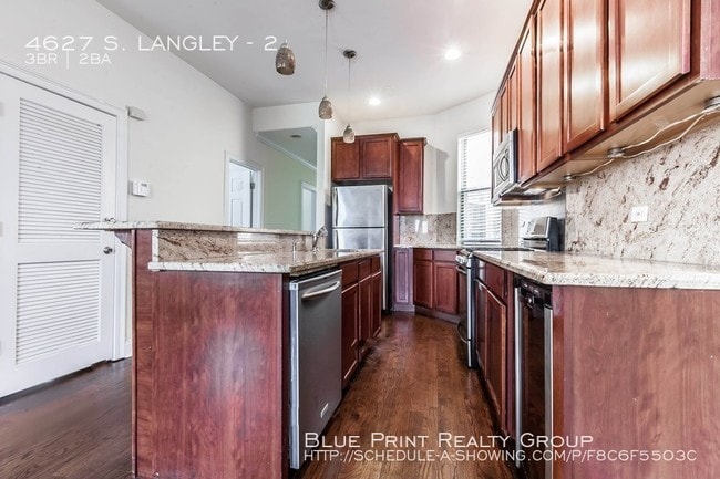 Building Photo - 4627 S Langley Ave