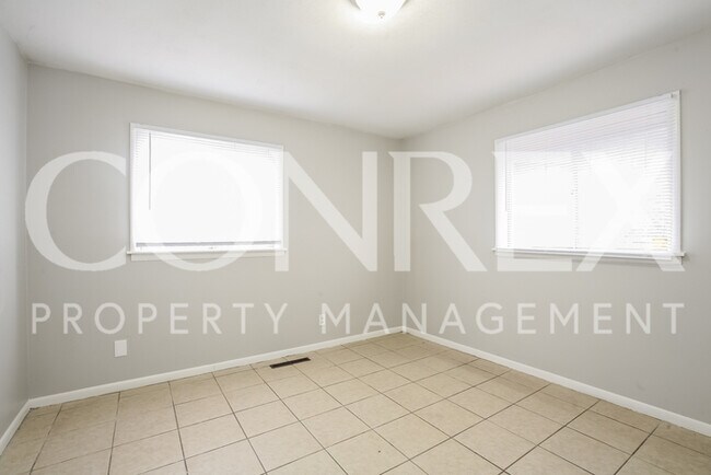 Foto del edificio - 6115 E 39th St