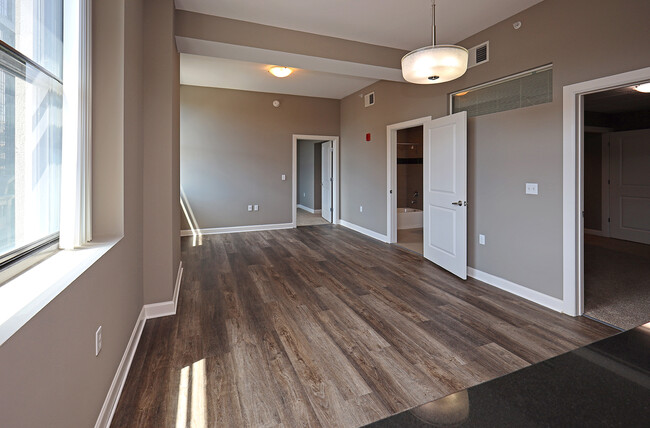 Model - Living Area with All New LVT Hard Surface Flooring - The Residences At Hanna