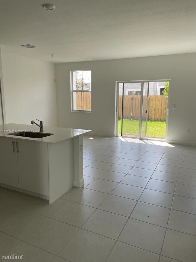 Building Photo - 3 br, 2.5 bath House - 11922 NW 47th Mnr #...