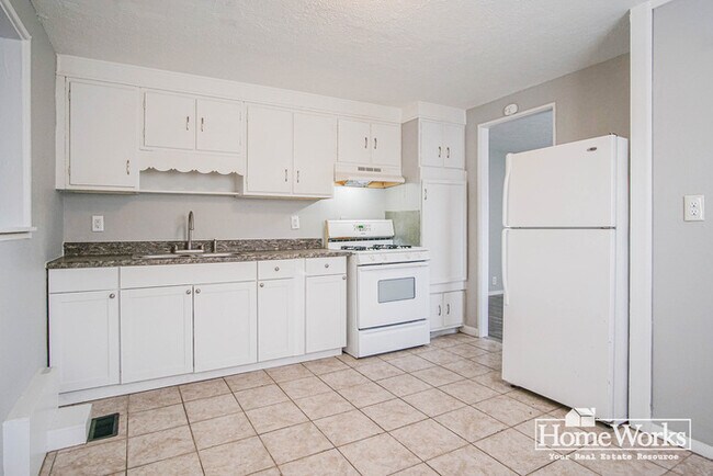 Building Photo - Well-maintained two-bedroom, one-bath home with a practical layout, & cozy living areas.