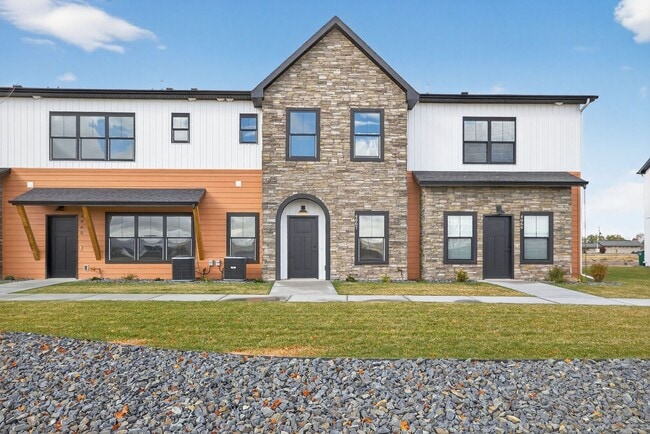 Building Photo - BRAND NEW3 BED 2.5 BATH TOWNHOME WITH 2 STALL GARAGE