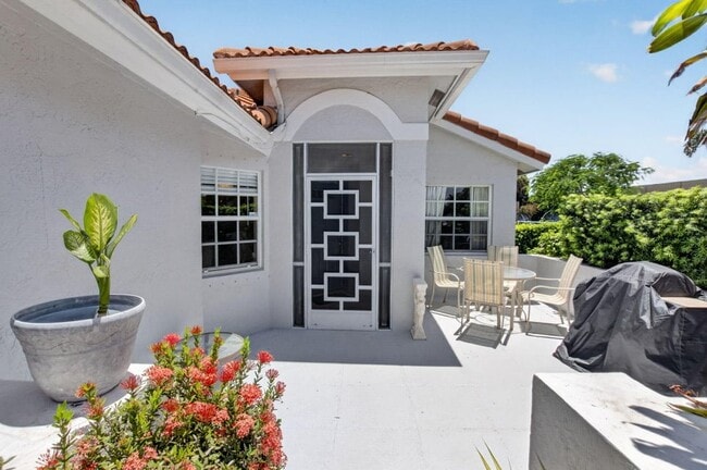 front porch with patio/barecue - 8108 Summer Shores Dr