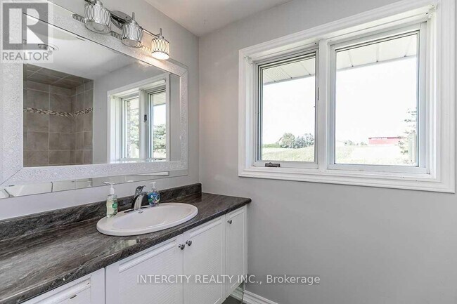 Photo du bâtiment - 7512 5th Side Rd