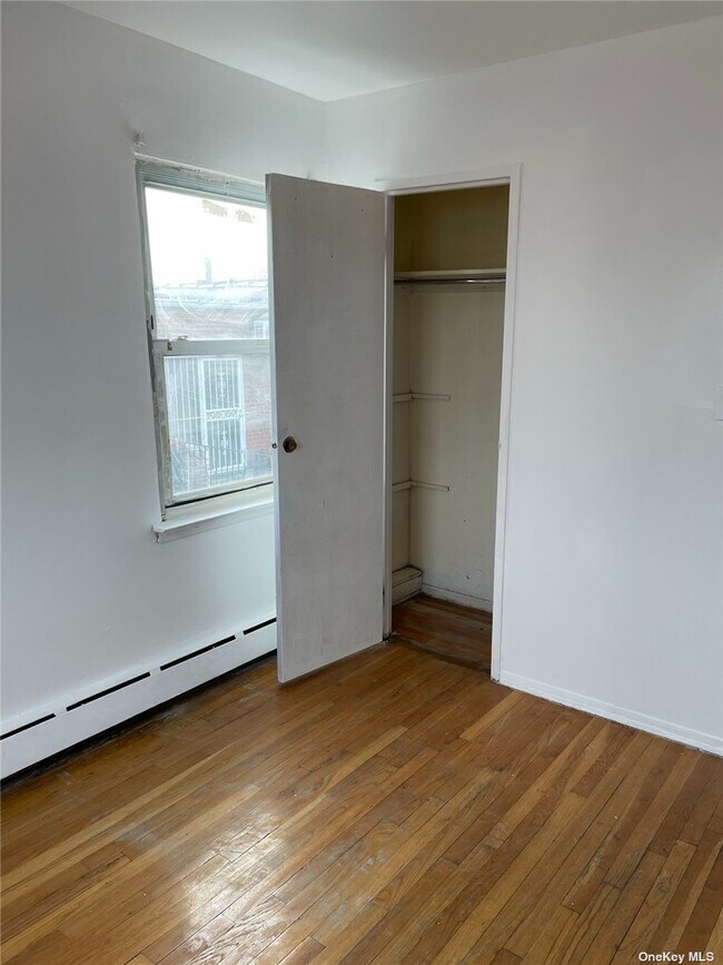 Building Photo - 30-57-57 69th St