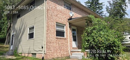 Building Photo - 5085-5085 Quincy St NW