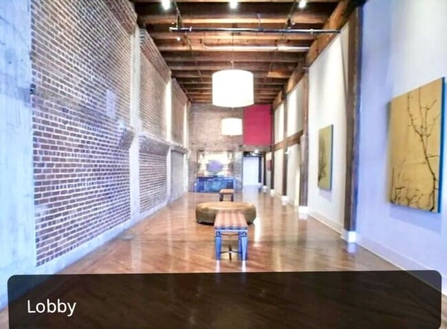 Building Photo - Modern Condo on Front St. with River views...