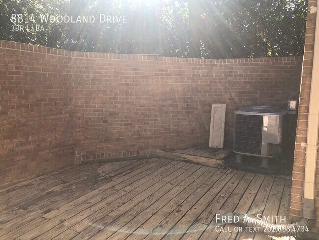 Building Photo - 8814 Woodland Dr