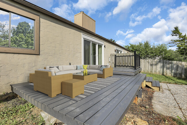 Large 2 level deck in fenced back yard - 2991 Cranston Dr