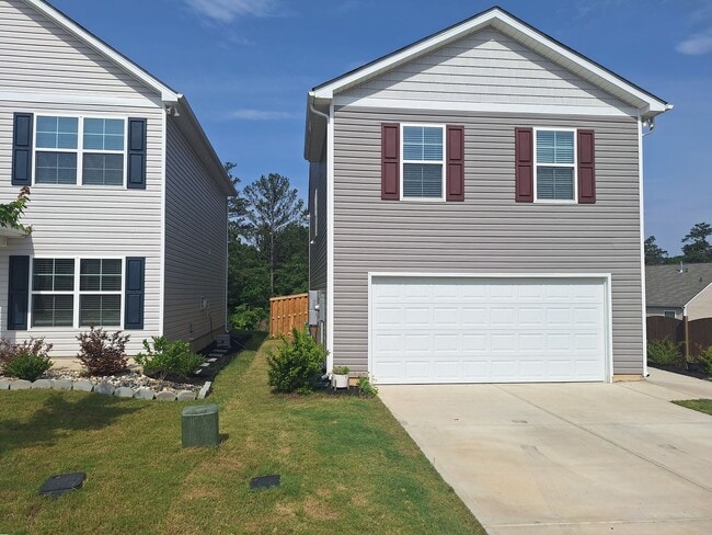 Building Photo - Lovely Four Bedroom Home  Appropriately 5 ...