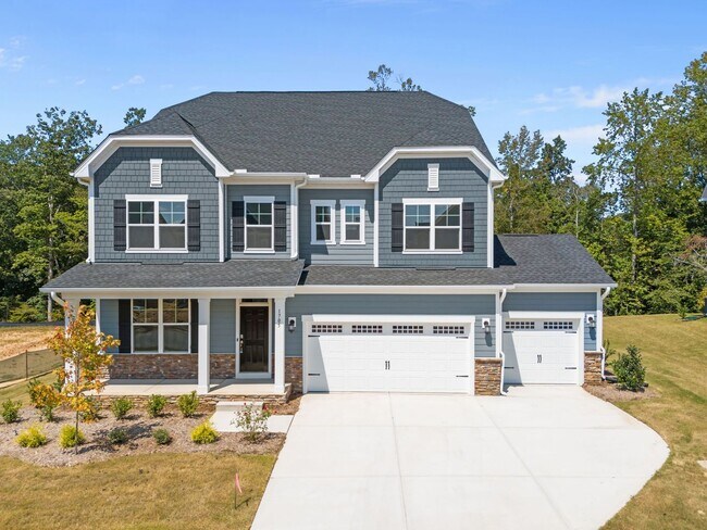 Foto del edificio - Brand-New 5BR/4BA in Knightdale’s Stoneriver – Luxury Living with 3-Car Garage