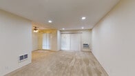Located at 455 Crescent Ave in Sunnyvale, California, this single-floor unit offers a well-organized layout with a bright, neutral palette throughout. The expansive living area is finished with plush wall-to-wall carpeting and features recessed lighting, a ceiling fan, and two large sliding glass doors fitted with vertical blinds that invite natural light and provide access to the outdoors. A wall-mounted HVAC unit ensures year-round climate control in this space.

The kitchen is equipped with white cabinetry, granite-style countertops, a full-size refrigerator, dishwasher, and tile flooring, offering a clean and functional workspace. A tiled entryway with recessed lighting provides a welcoming transition into the unit.

The bedrooms are carpeted and include baseboard heating and sliding glass doors that frame outdoor greenery. One bedroom features mirrored sliding closet doors, adding depth and reflecting natural light throughout the room.

The bathroom is well-appointed with a wide vanity, granite-style countertops, white cabinetry with brushed nickel hardware, a mirrored medicine cabinet, and tile flooring. A shower-tub combination with sliding glass doors completes the space. Overall, the unit presents a functional and comfortable living environment in a desirable Sunnyvale location.