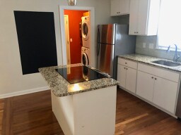 Kitchen looking into back entry/laundry - 716 Fatherland St