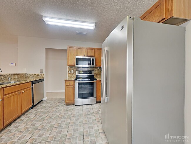 Building Photo - 7944 Cherry Blossom Dr S