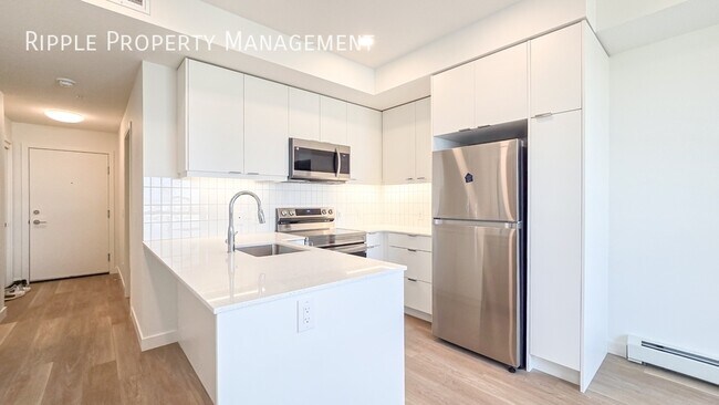 Building Photo - Modern 2 Beds, 2 Baths Apartment/Condo | N...