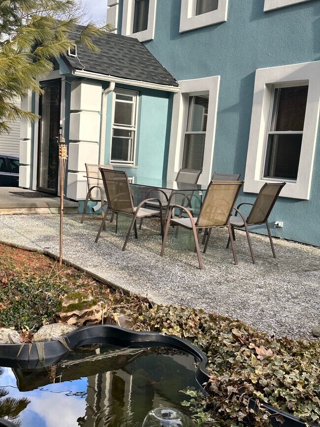 Front Patio is surrounded by mature trees - 72 Glenside Ave