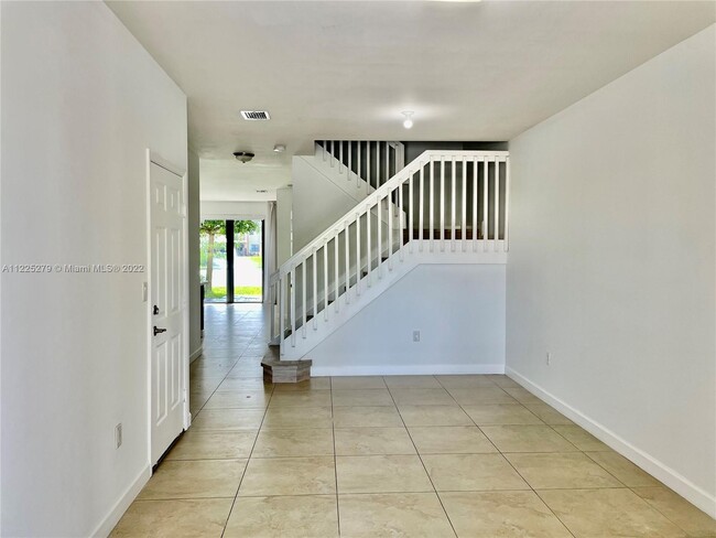 Building Photo - 5980 NW 104th Ct
