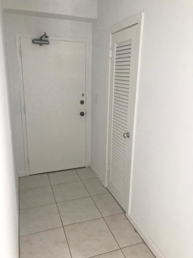 Door/hallway entrance and small closet - 1430 Brickell Bay Dr