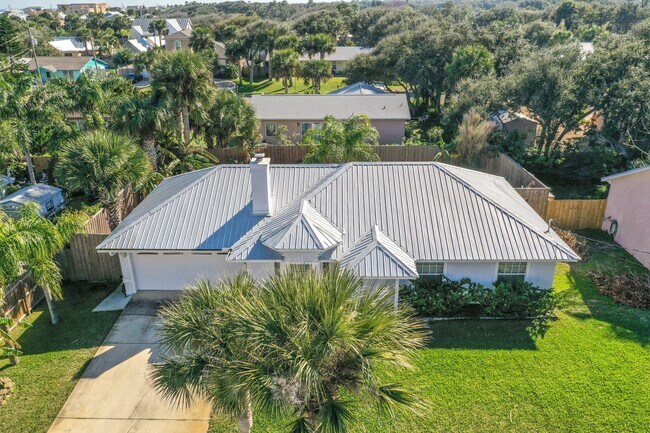 Building Photo - Live at the Beach year round !