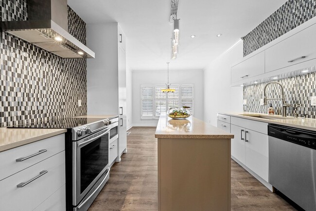 Building Photo - Rare Luxury 3-Story Townhome in Walton School District – Dual Kitchens, Double Decks & More!