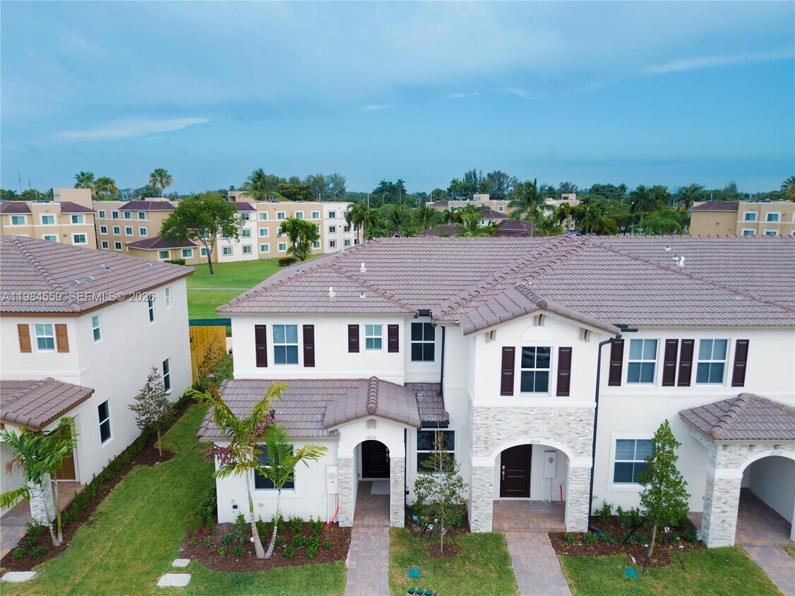 Photo - 12133 Northwest 23rd Court Apt #12133, Miami, FL 33167 - 3 BR 3 BA townhouse