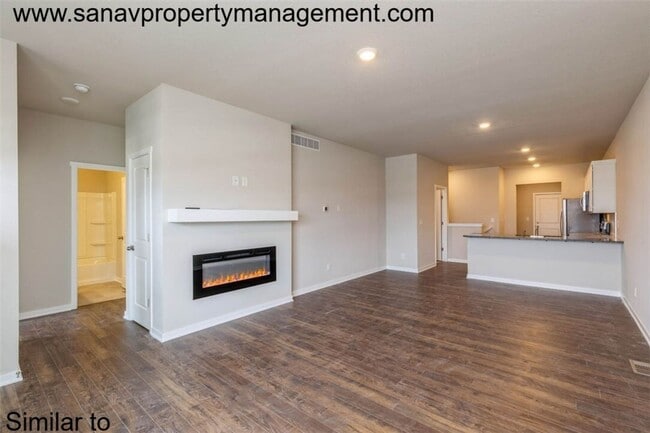 Building Photo - "Charming 2-Bedroom Home in Exclusive 36 W...