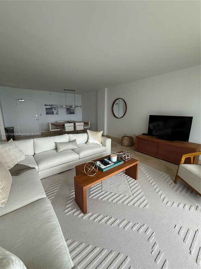 Building Photo - 10275 Collins Ave