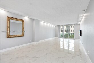 Building Photo - 19380 Collins Ave