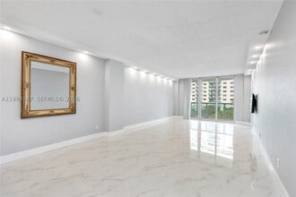 Building Photo - 19380 Collins Ave