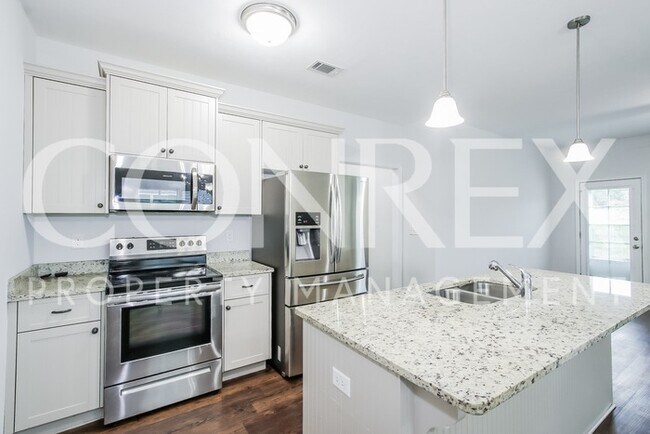 Foto del edificio - Modern and Spacious 4 Bedroom