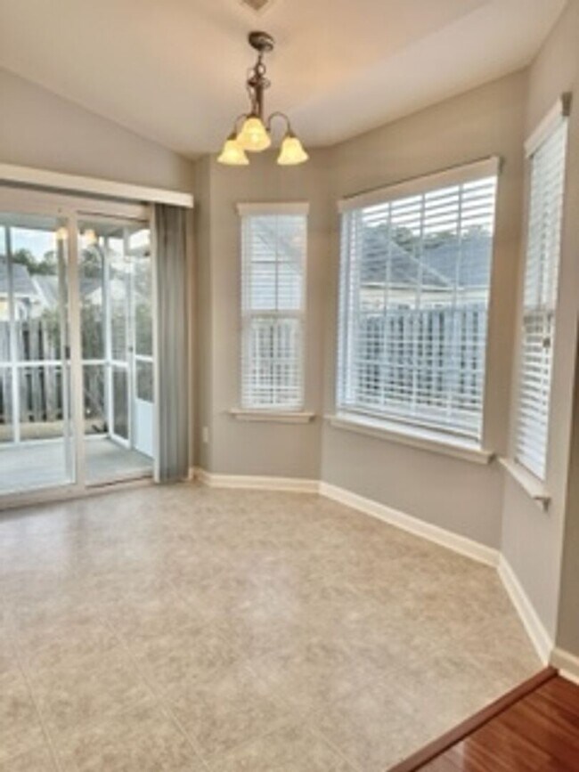 Building Photo - TWO BEDROOM GARDEN HOME IN GATED COMMUNITY