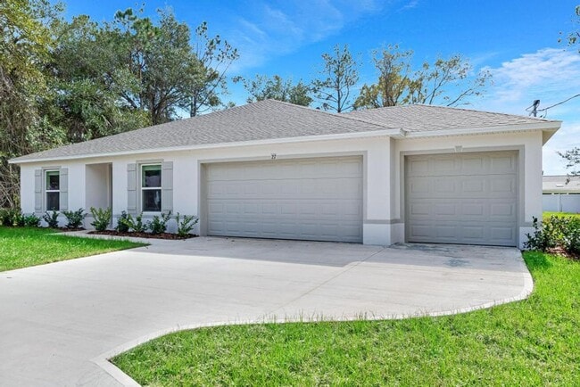 Foto del edificio - Stunning new home with 3 car garage