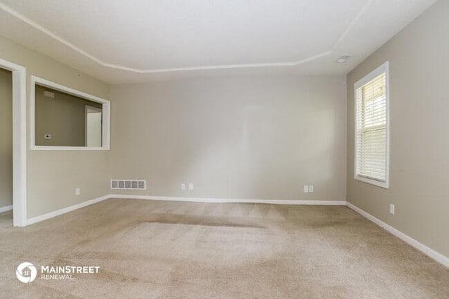 Building Photo - 1602 Cooper Dr, Raymore, MO 64083