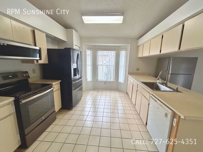 Building Photo - Desirable Citrus Park Living: Modern Home ...