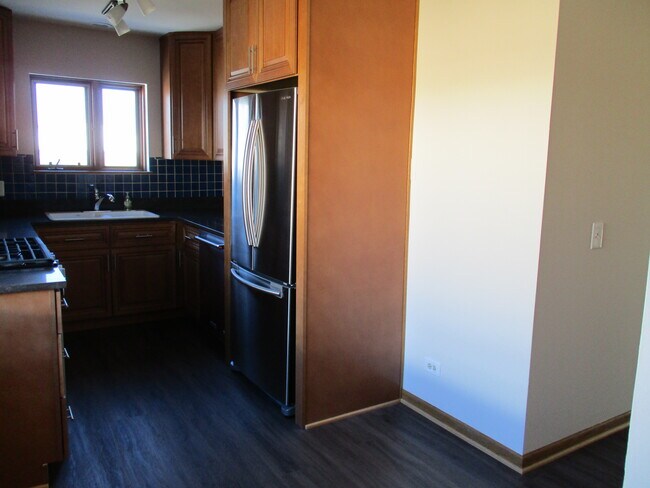 Building Photo - 6596 N Ogallah Ave