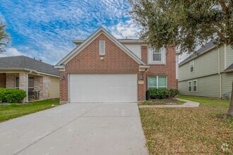 Building Photo - 13510 Dahlia Green Way