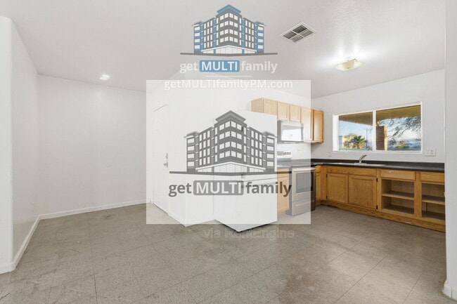 Building Photo - 1228 E Apache St