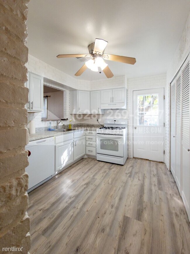 Building Photo - 4 br, 2.5 bath House - 7711 Queens Park Ro...