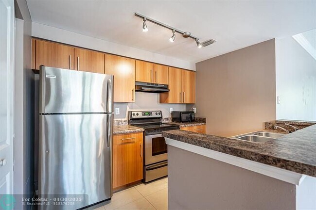 Foto del edificio - 5840 W Sample Rd